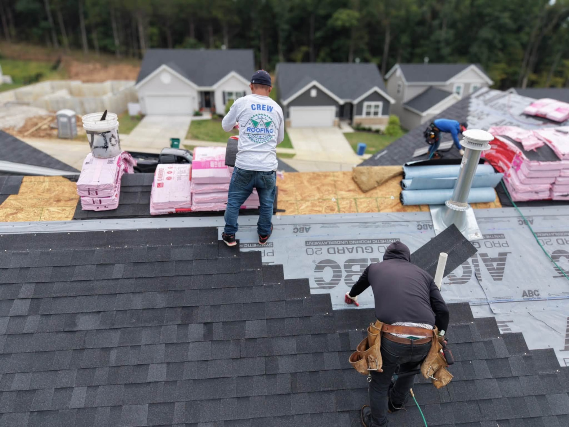 ECI crew installing architectural shingles
