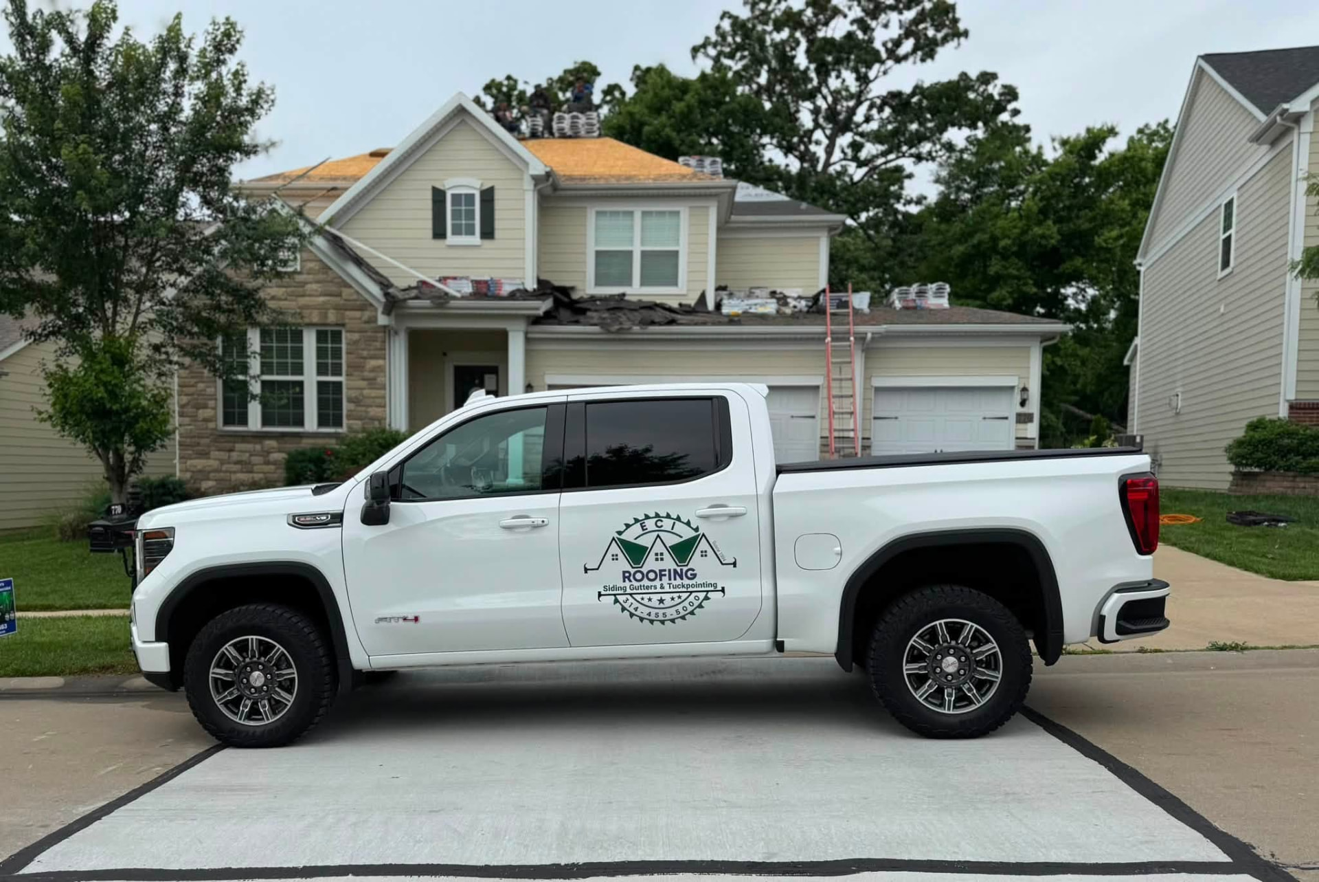 ECI truck at a Kansas City area roof mid-tear-off