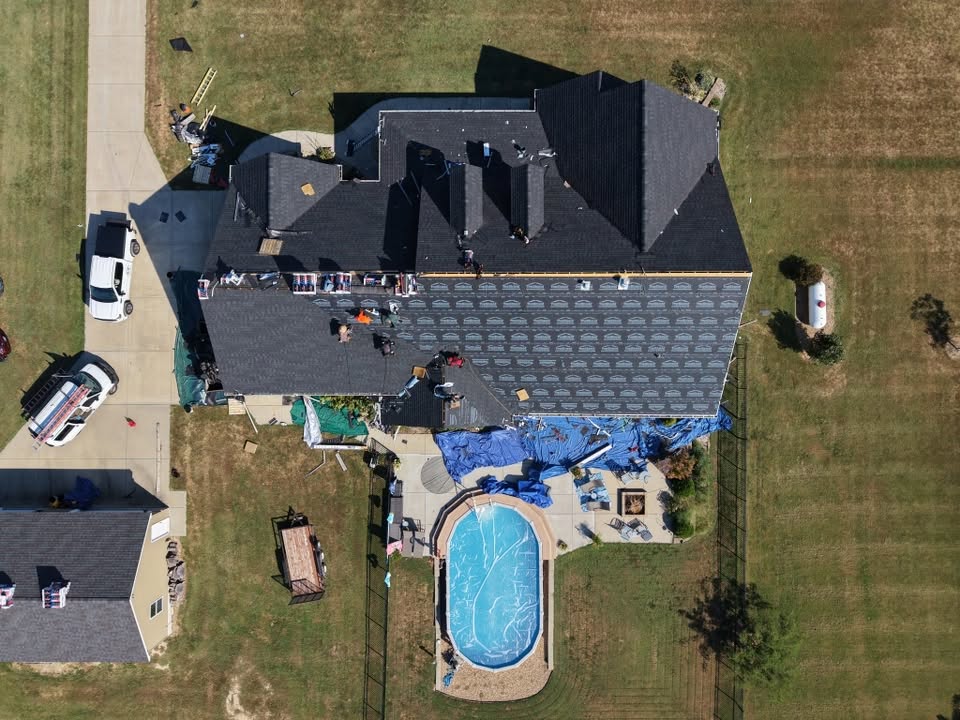 Overhead of a roof replacement with property protected