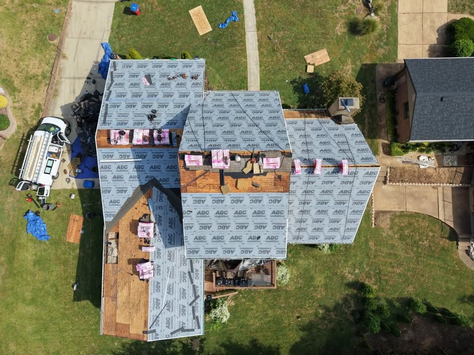 Top-down view of underlayment going down